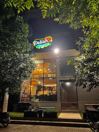 Delish Pizza Bar is located in DHA Raya Commercial Phase 6 in Lahore. Delish Pizza Bar focuses on different foods, but its main dish is pizza, and it offers good, tasty pizzas.