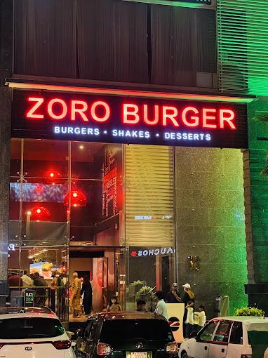 Zoro Burger is located in DHA Raya Commercial, Phase 6. Zoro Burger is an Australian brand focused on smash burgers, and it has a variety of other fast food options, including chicken burgers and beef burgers.