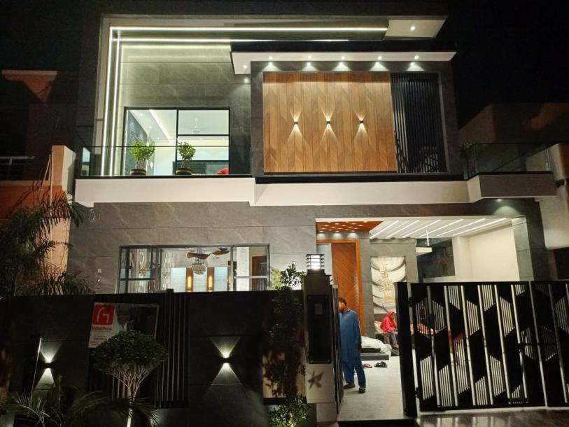 10 Marla  brand new modern design house  for sale  in the hot location-1